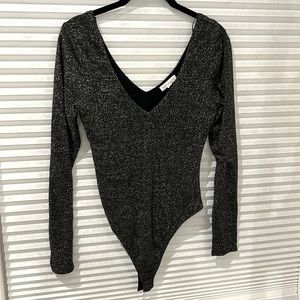 Long sleeve,  black and silver, deep v-neck body suit by Socialite